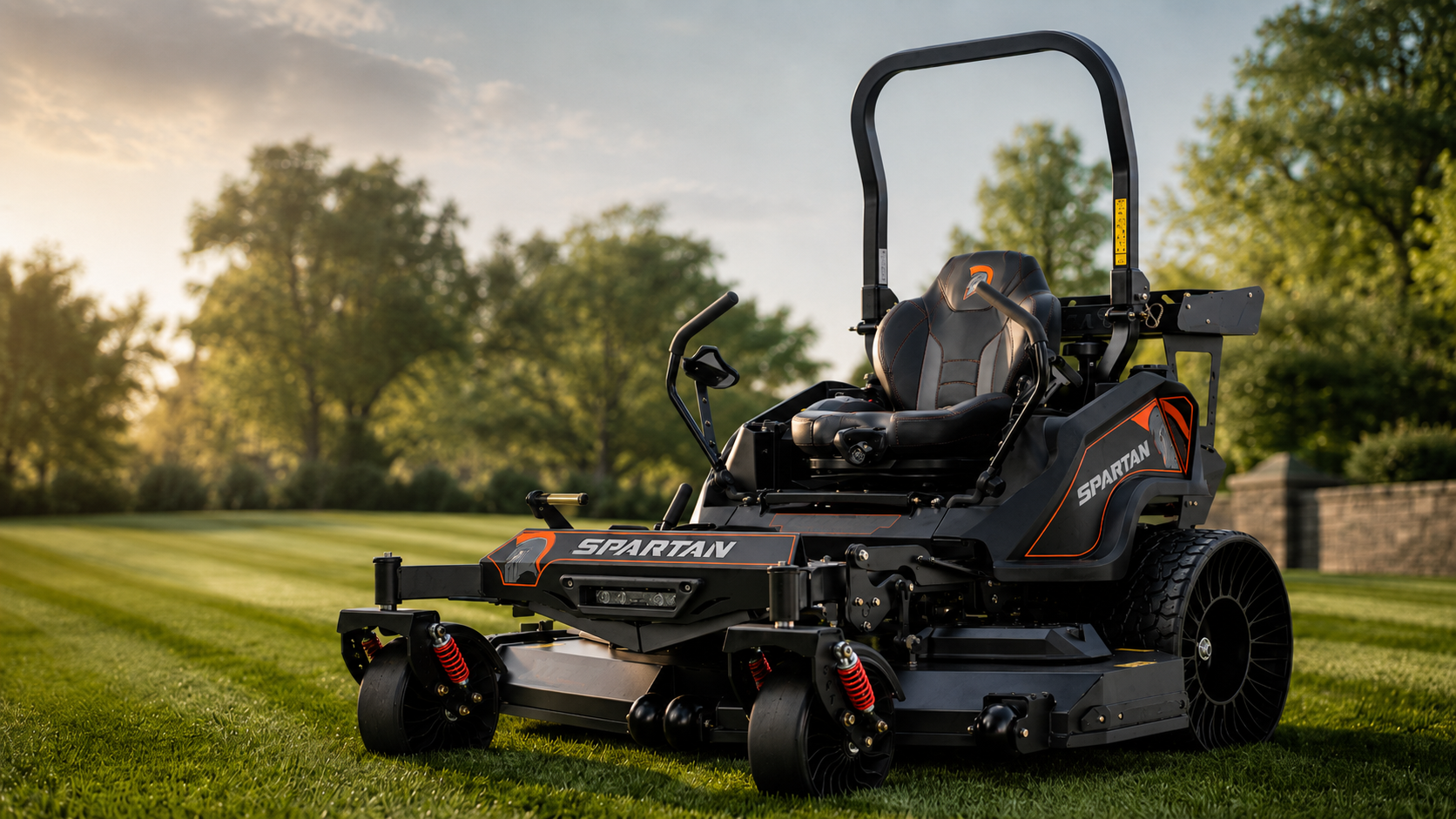 Spartan KGZ-XD zero-turn mower on a wide lawn at golden hour
